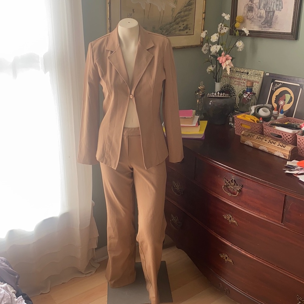 Tanned Woman’s Suit